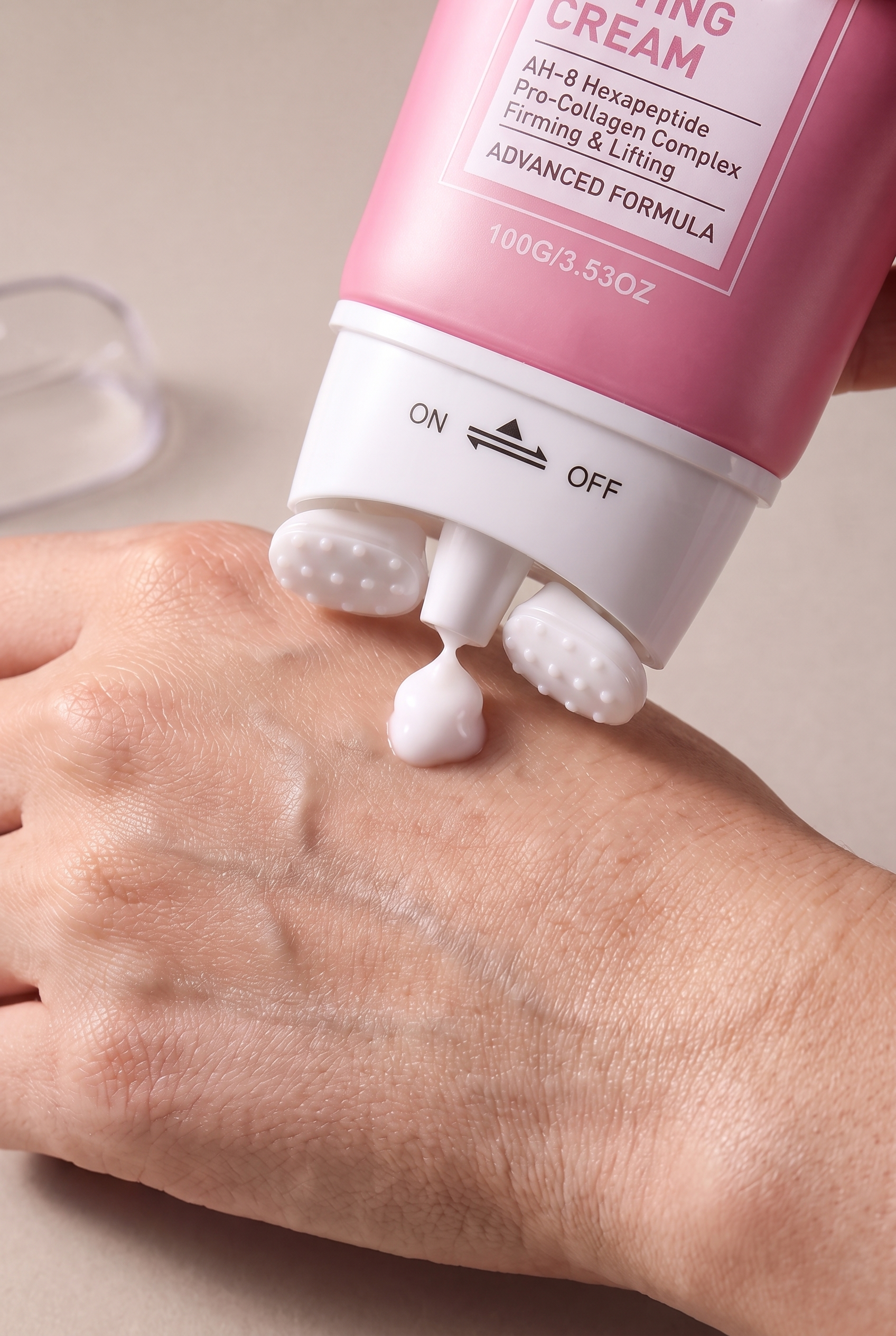 Applying the peptide cream along the jawline and neck